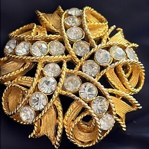 Brooch, gold with rhinestones